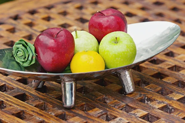 Thai exotic tropical fruits in luxury silver basket, welcome fruit basket in hotel