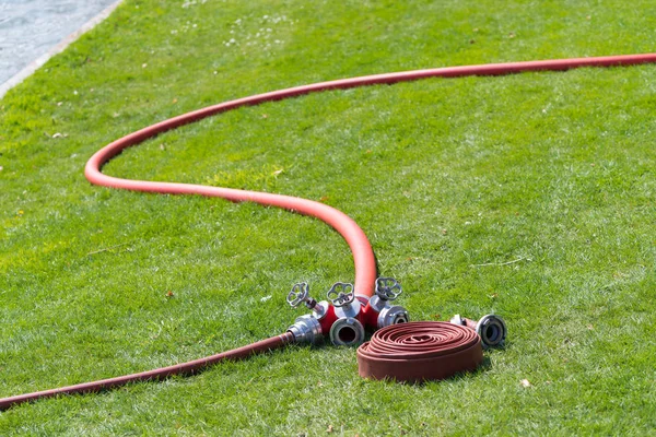 Several Red Firehoses Connector Piece — Stock Photo, Image