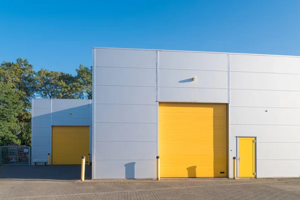 Small Industrial Unit Yellow Roller Doors — Stock Photo, Image