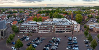 OLDENZAAL, NETHERLANDS - AUGUST 23, 2025: Aerial view of the local town hall in a small village in the eastern part of the country