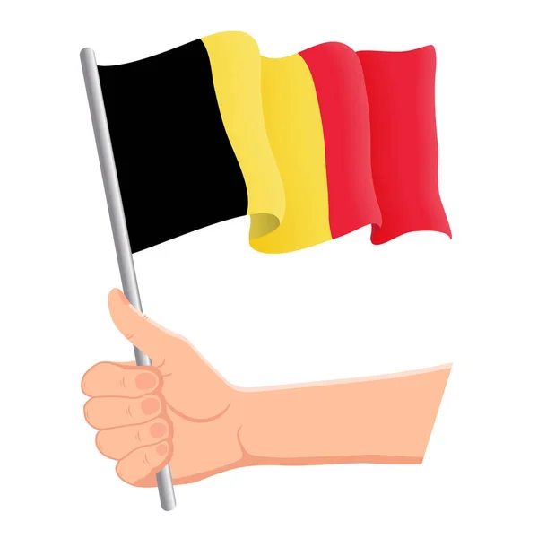 Belgium nemzeti zászlaját kézben tartó és integető. Rajongók, a függetlenség napja, a hazafias koncepció. Vektoros illusztráció — Stock Vector