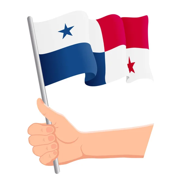 Mão segurando e agitando a bandeira nacional do Panamá. Fãs, dia da independência, conceito patriótico. Ilustração vetorial — Vetor de Stock