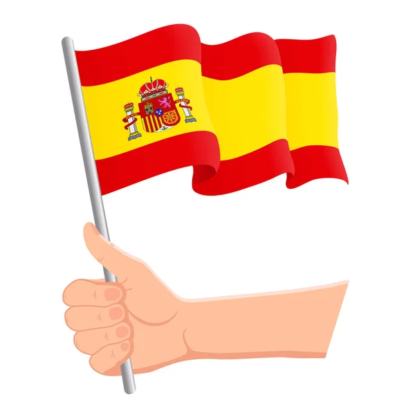 Hand innehav och vifta med Spaniens nationella flagga. Fläktar, Självständighetsdagen, patriotiska begrepp. Vektor illustration — Stock vektor