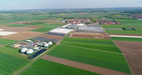 Camera flight over biogas plant from pig farm. Renewable energy from biomass. Modern agriculture European Union. aerial view, panoramic view from the air — Stock Video