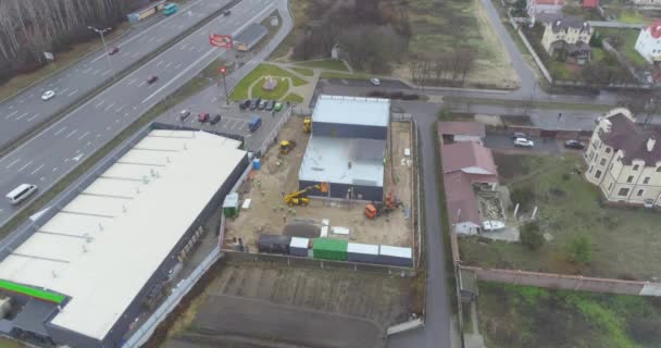 Construcción de una tienda moderna. Edificio vista aérea de construcción. Construcción moderna — Vídeos de Stock