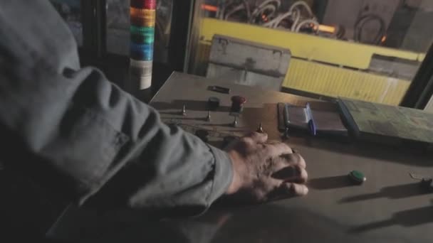 Man presses buttons on the control panel of the factory. Board panel close-up. The control panel in the factory. — Stock Video