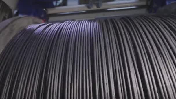 Cable factory. Winding of the electrical cable to the bobbin in the production. Cable pdroduction. Closeup — Stock Video