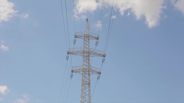 Electricity transportation line. High-voltage tower. Beautiful clouds on the background of Electricity pylons time lapse. Electricity transportation line. High-voltage tower — Stock Video