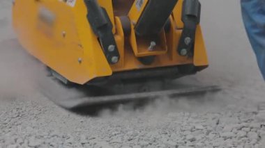 Toprak titreşimli plaka. Tokuşturucu. İnşaat Çalışma Akışı