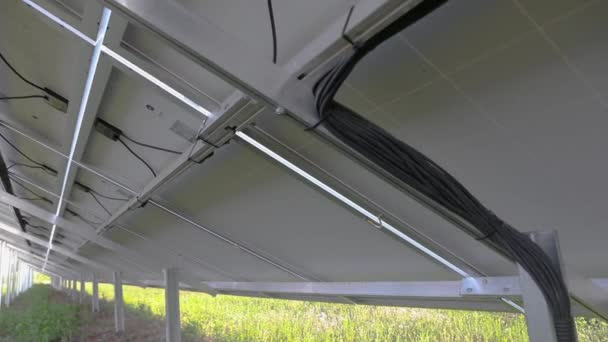 Solar penel on the back side, solar panel below — Stock Video