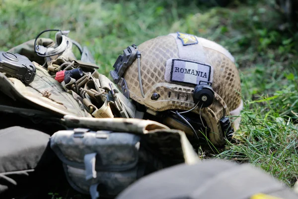 CONSTANTA, ROMANIA - JUNE 23, 2018: Equipment of Romanian military paratroopers lay on the ground before a jump, on June 23