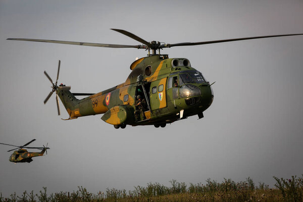 BABADAG, ROMANIA - June 24, 2018: A SA 330 Puma helicopter takes part at a military exercise, at dawn on June 24.