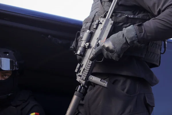 Bucharest, Romania - December 1, 2018: Anti terrorist officer from the Romanian Intelligence Service, armed with a MP7 Heckler & Koch Submachine Gun, at the Romanian National Day military parade.