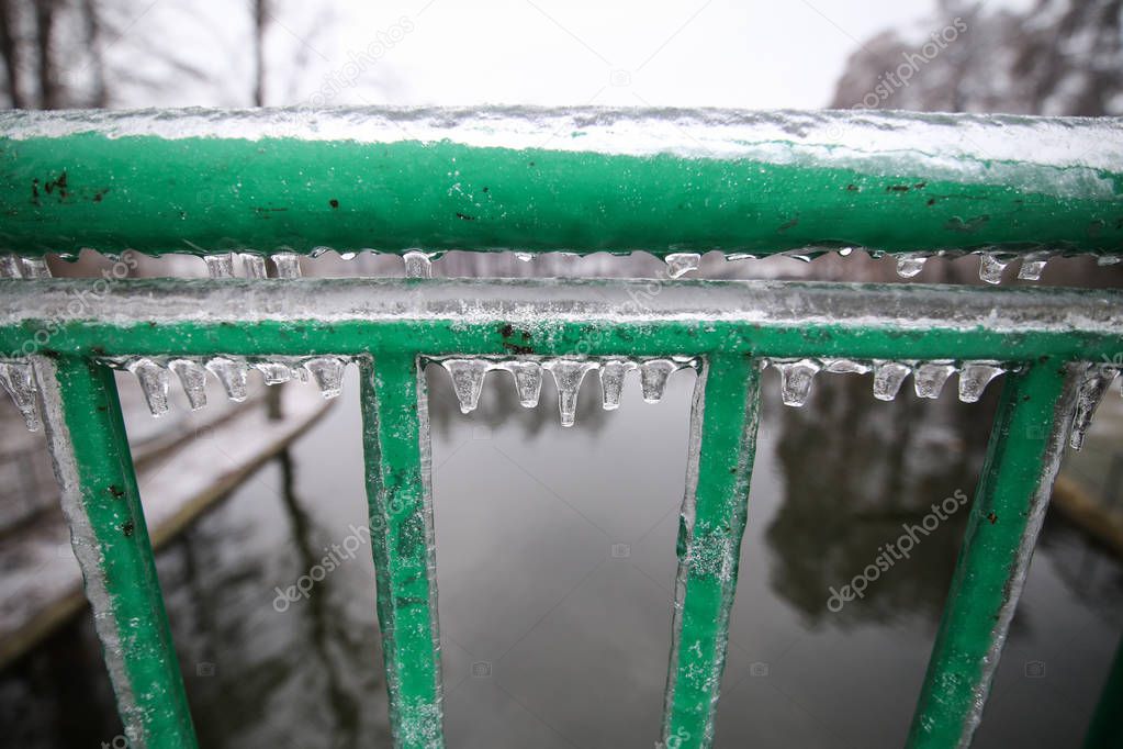 Hanging icicles after a freezing rain weather phenomenon