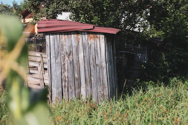 Wooden outdoor toilet in a village in rural Romania — Stock Image Wooden outdoor toilet in a village in rural Romania Royalty Free Stock Images