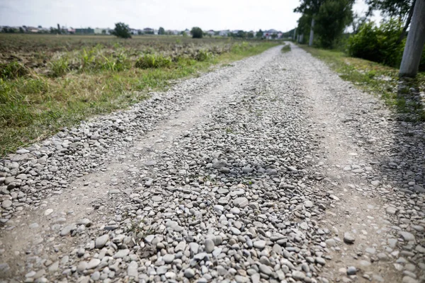 Płytki Obraz Głębi Ostrości Ostrość Selektywna Kamienną Drogą Nieutwardzoną — Zdjęcie stockowe