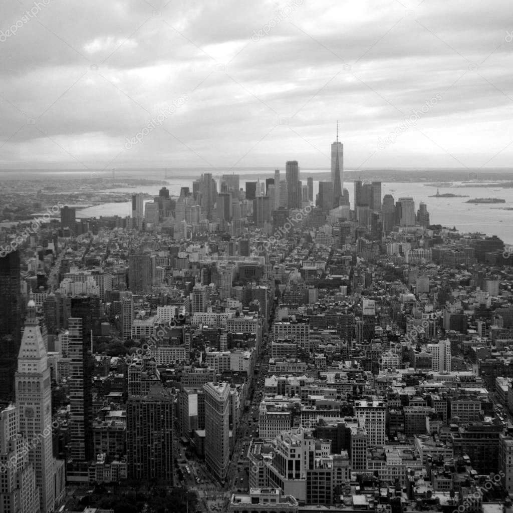 View of Lower Manhattan from the top of Empire State Building. Scanned film photo. Scanned black and white film photo. Captured with a medium format SLR camera from 1960s.