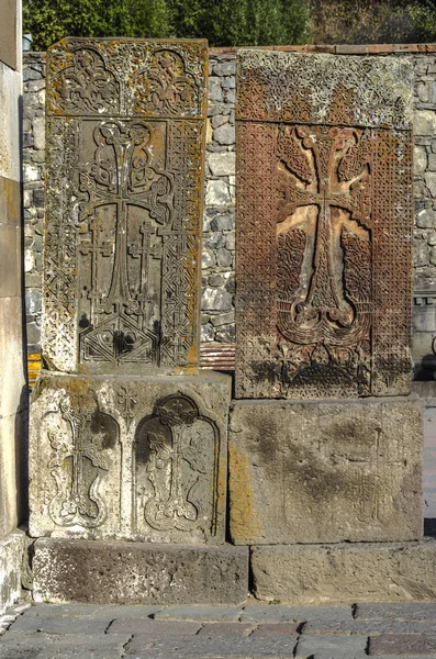 Medieval khachkars carved in the 12th century and installed near the Katoghike church in the Geghard monastery in Armenia — Stock Photo, Image