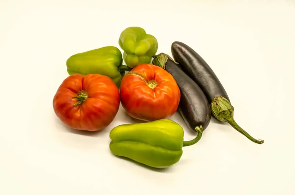 Group Fresh Vegetables Green Sweet Peppers Large Red Tomatoes Black — Stock Photo, Image