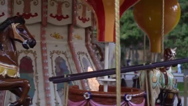 French carousel in the city amusement park. — Stock Video