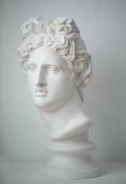 Gypsum statue of Apollo's head. Man. Statue.  clipart