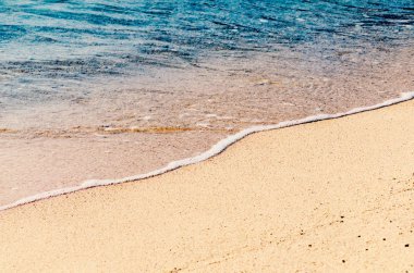 Sandy okyanus plaj, yumuşak odak. Tropikal fotoğraf geçmiş. Seasca