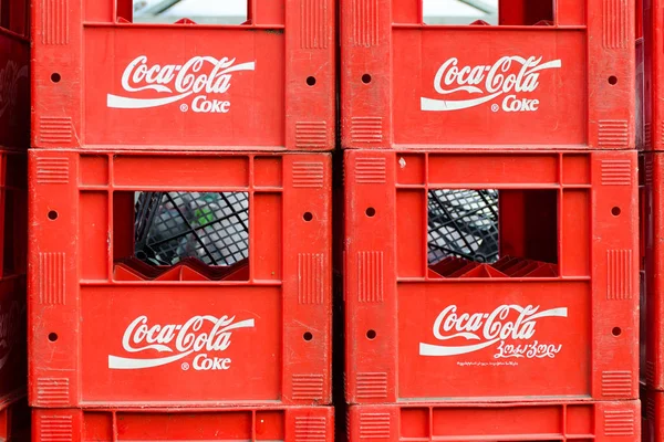 Stacks of Coca Cola boxes. — Stock Photo, Image