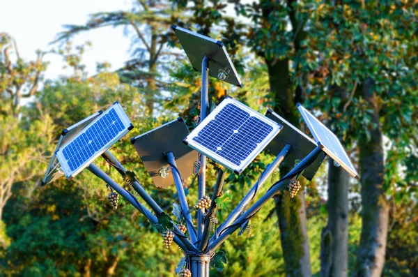 Creative, treelike solar panels in the city park.