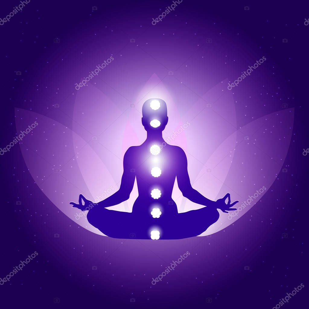Silhouette of Person in yoga lotus asana on dark blue purple background with lotus flower and light.