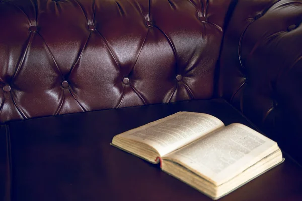 Background Open Old Book Claret Colored Leather Sofa — Stock Photo, Image