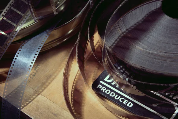 Csappantyú Film Film Tekercs Egy Fából Készült Háttér — Stock Fotó