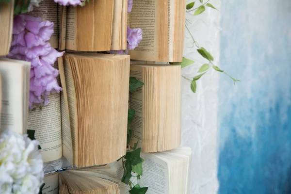 Concept Background Opened Books Wall Flowers Artificial Purple White — Stock Photo, Image