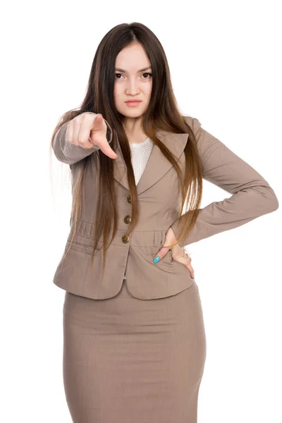 Mujer joven de negocios señalando dedo derecho aislado sobre fondo blanco . —  Fotos de Stock
