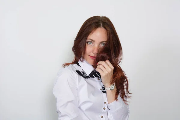 Closeup of a thoughtful red-haired woman isolated — Stock Photo, Image