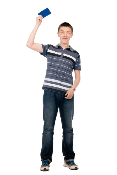 Happy casual young man in his raised hand holds a blue clean sheet. — Stock Photo, Image