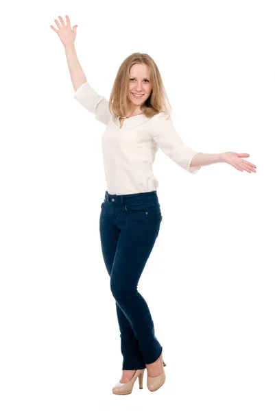 Portret van een vrolijke jonge vrouw in jeans met handen zijde geïsoleerd over witte achtergrond — Stockfoto