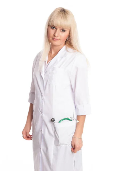 Retrato de uma enfermeira em um casaco branco com um estetoscópio . — Fotografia de Stock