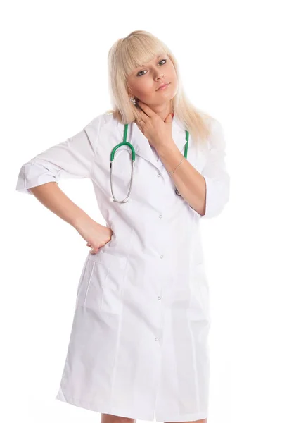 Jovem enfermeira em um casaco branco . — Fotografia de Stock