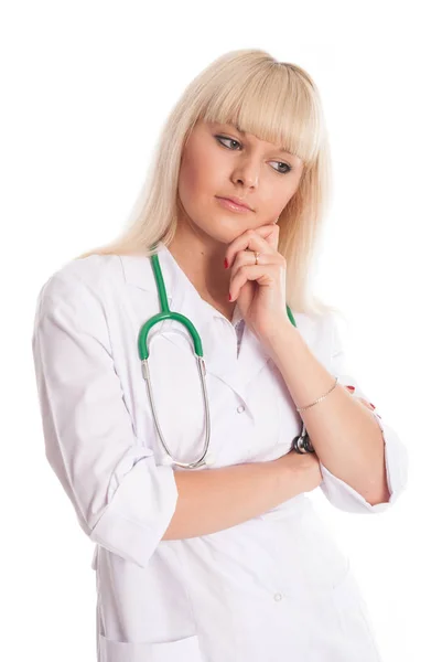 Enfermera reflexiva con un abrigo blanco . —  Fotos de Stock
