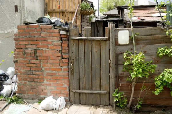 Background Old Wooden Door Brick Wall Trash Bags Village Slums — Stock Photo, Image