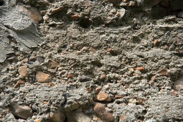 Närbild Bakgrund Cement Stiftelse Med Små Stenar Grus Bakgrund Koncept — Stockfoto