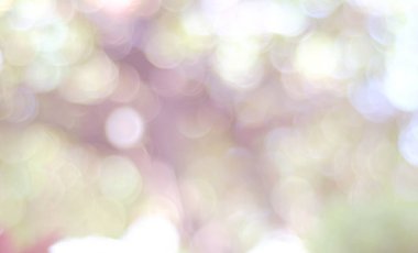 Bokeh pastel arka planının soyut hali. Bokeh ışığı. Çok renkli soyut arkaplanda parıldayan bulanık spot ışıkları