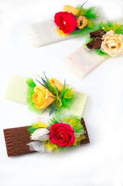 Presents in handmade paper gift pack with flowers on white background — Stock Photo, Image