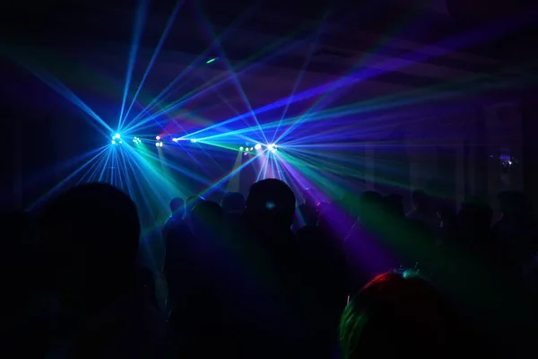 Disco lights and show. Concept about entertainment and party. defocused image for an artistic touch — Stock Photo, Image