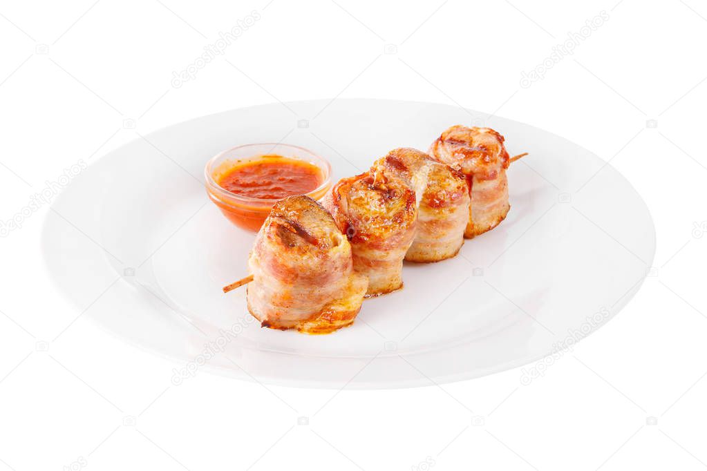 Shish kebab with sauce isolated white on plate