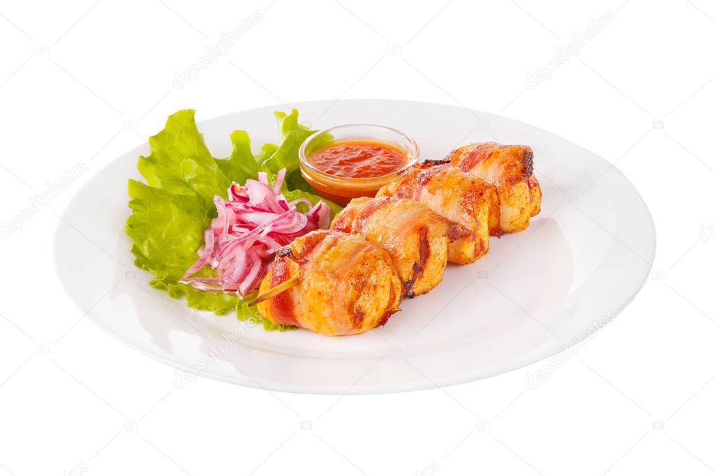 Shish kebab with onion, sauce isolated white