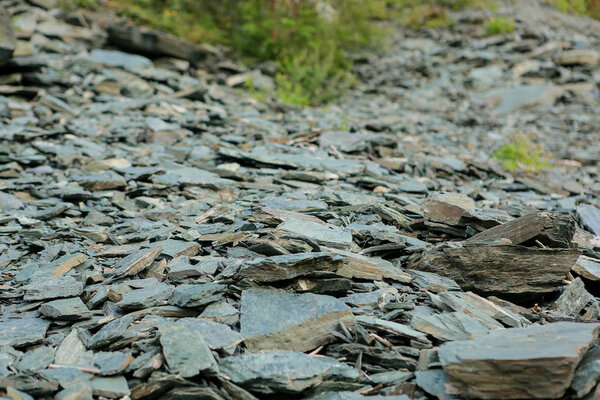 rocky trail in a mountainous area, outdoors