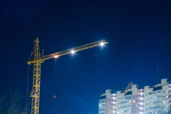 construction crane at night, the construction