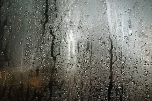 Gotas de chuva em vidro — Fotografia de Stock