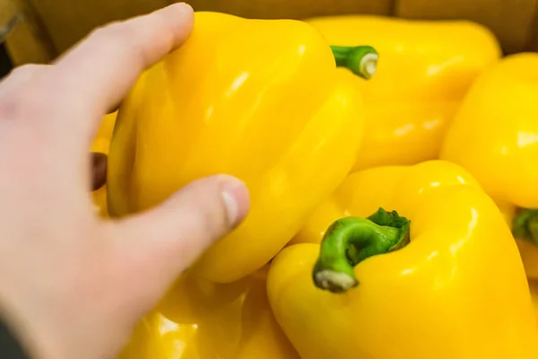 yellow bell peppers on the market